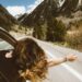 woman on a car road tripping